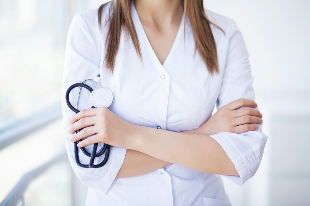 Medicine. Young female doctor in modern clinic